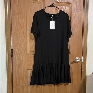 Elegant Black Midi Dress with Ruffle Hem